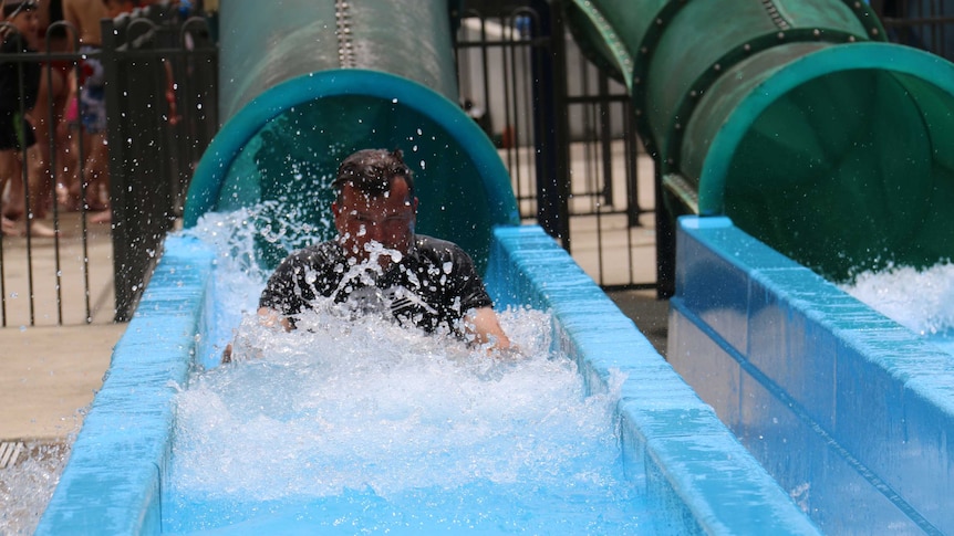 Man on slide at Big Splash, Jamison