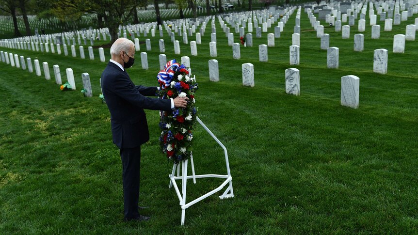US President Joe Biden lays a wreath at Arlington National Cemetery to honour fallen veterans of Afghan conflicts.