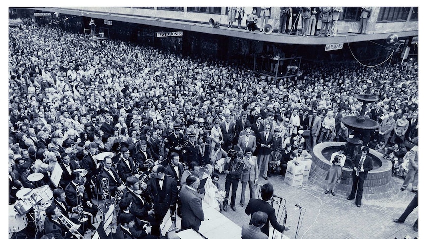 Performers and the public gather for the opening of Adelaide's Rundle Mall.