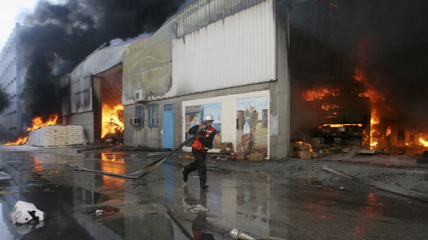 A UN witness says 'certain neighbourhoods are obliterated ... just piles of rubble.'