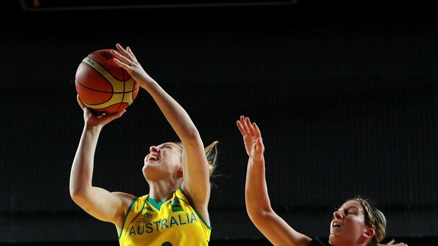 Cruising home ... the Boomers' Suzie Bates drives to the basket against the Tall Ferns.