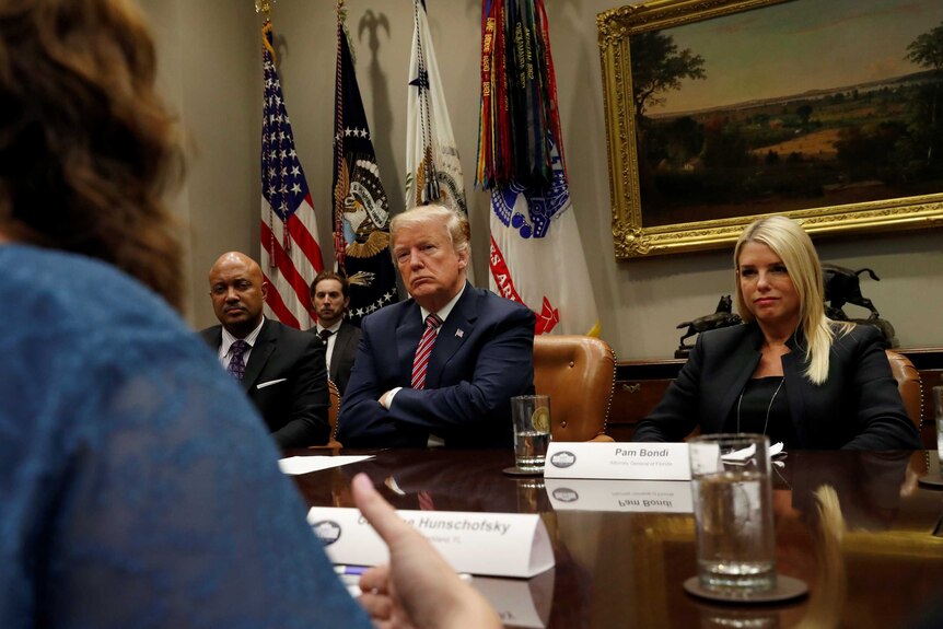 Donald Trump listens to discussion about gun control in the White House after the Parkland shooting, February 2018.