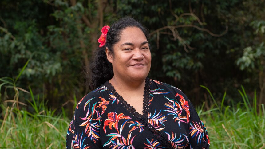 A Tongan-Australian woman surrounded by greenery.