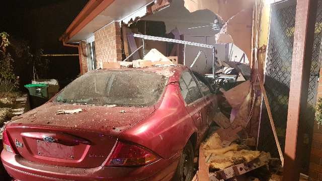 Red car smashed into Richardson home in Canberra