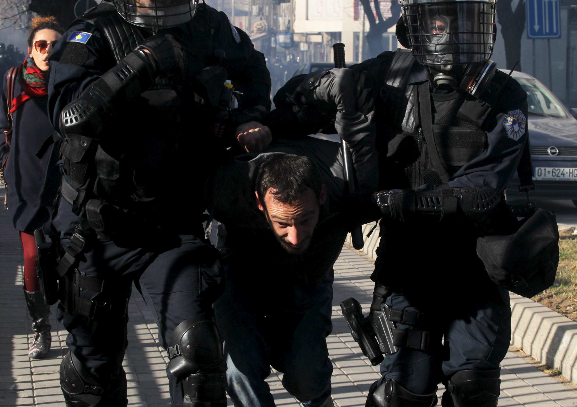Protesters clash with riot police in Kosovo over EU-brokered Serbia ...