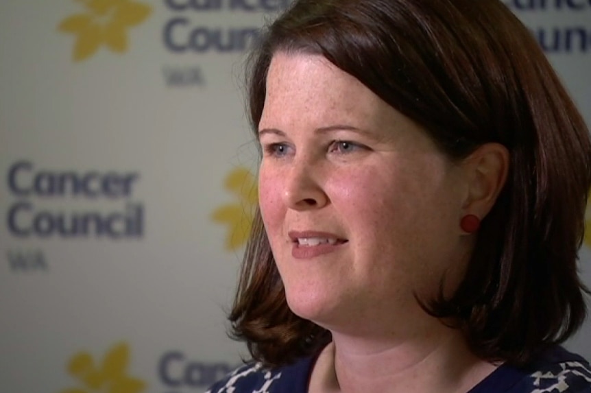 A headshot of a woman in front of Cancer Council branding