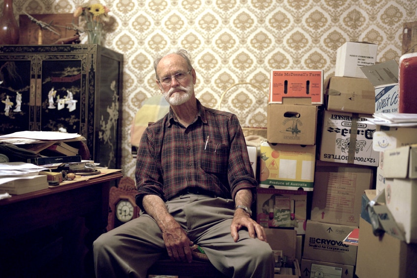 Portrait of a Whistleblower: Avon Hudson in his office surrounded by his archives.