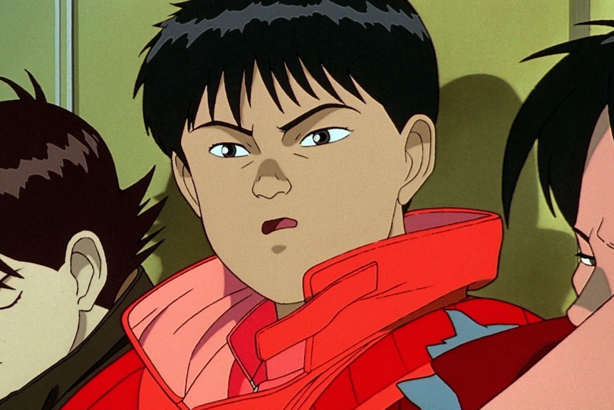 A screenshot of protagonist Shōtarō Kaneda wearing a red jacket.