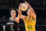 Two netball players challenge for the ball during the Constellation Cup Test between New Zealand and Australia in Christchurch.