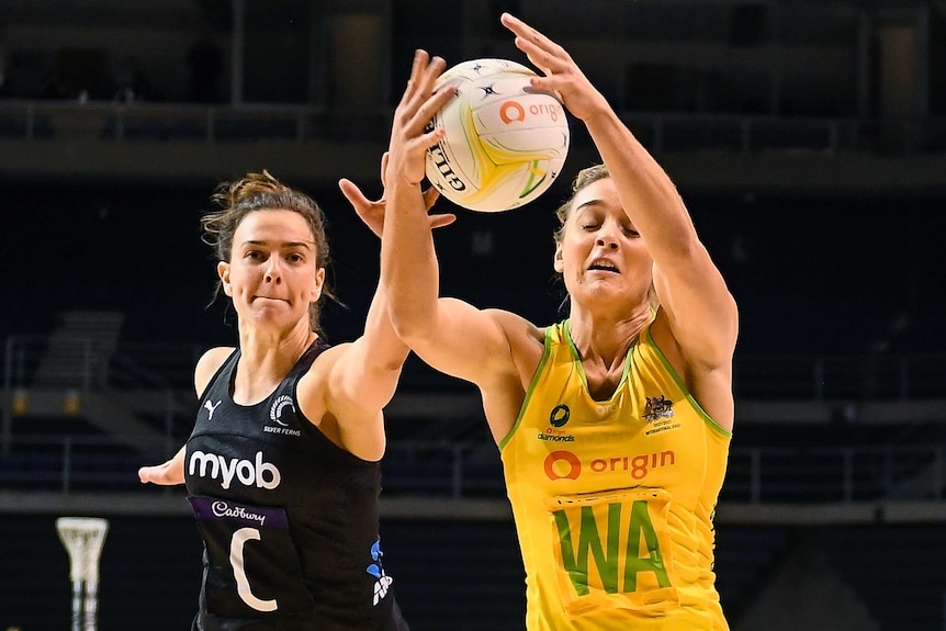 Two netball players challenge for the ball during the Constellation Cup Test between New Zealand and Australia in Christchurch.