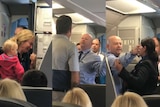 A passenger onboard the aircraft recorded the altercation in which the American Airlines employee is escorted off the plane.