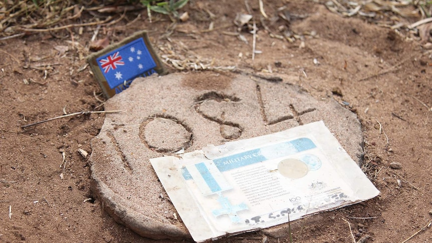 A close-up of the unmarked grave of Cecil Northover.