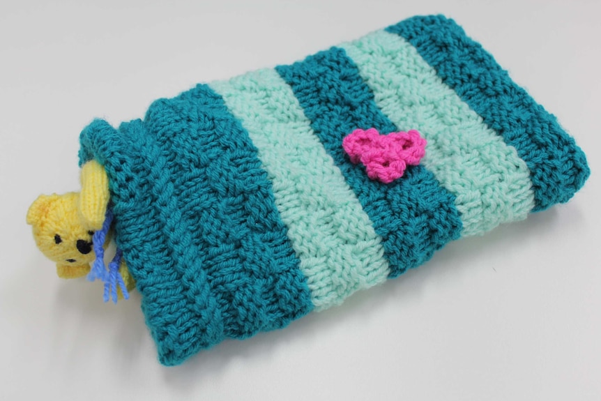 A knitted twiddle Muff donated in Bundaberg, Queensland