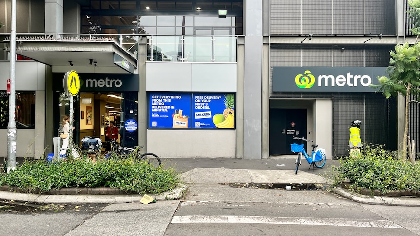 The exterior of a Woolworths Metro store in Redfern, Sydney, with Milkrun advertising on the exterior. 