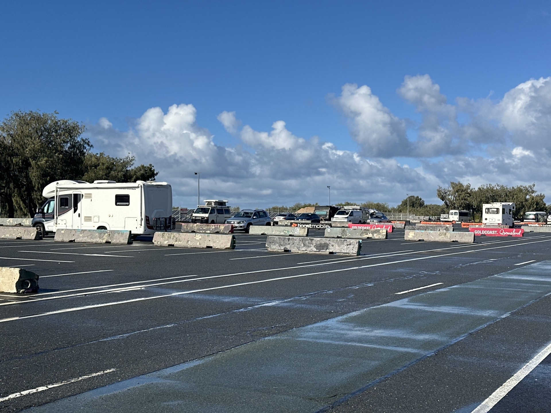 vehicles parked in public car park.