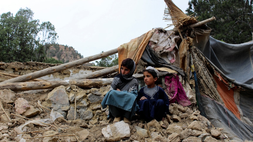 Afghanistan earthquake survivors frantically dig among the rubble, searching for their relatives as relief pours in