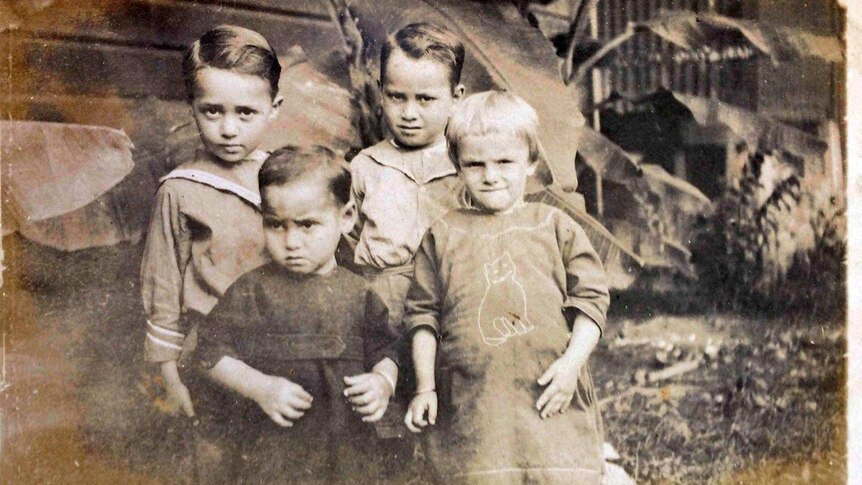 A sepia coloured photo of the Ninnes family as children