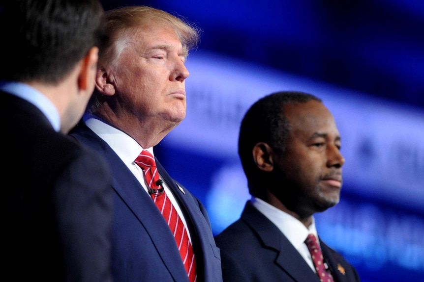 Donald Trump and Dr Ben Carson pause for a photo before the start of the debate.