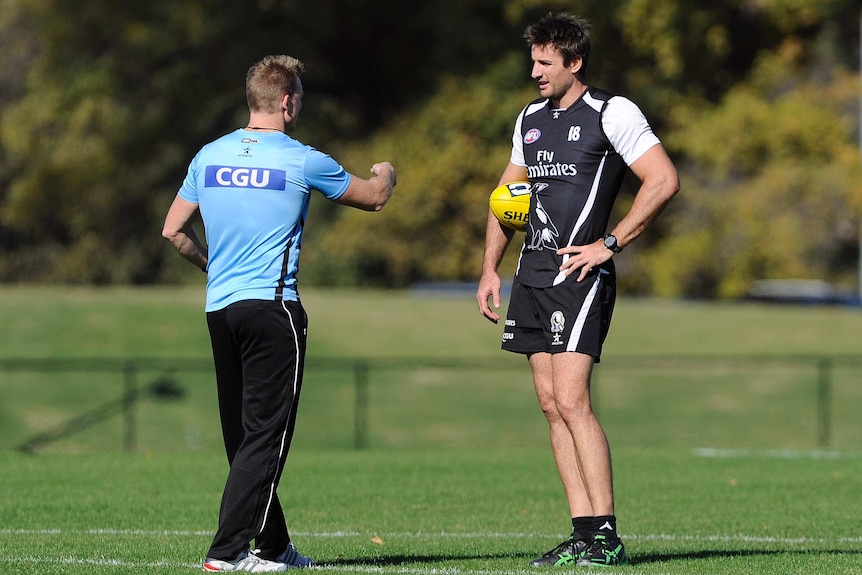 Collingwood coach Nathan Buckley and ruckman Darren Jolly