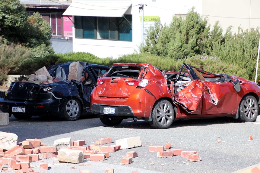 Two badly damaged parked cars outside the Matilda Bay Brewing Company in Fremantle.