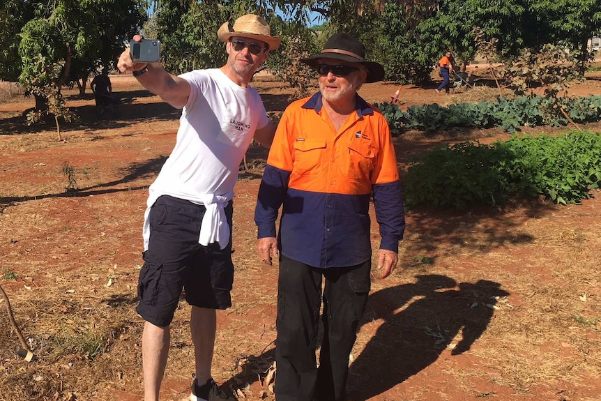 Kimberley TAFE lecturer Kim Courtney (right) snaps a selfie with Hugh Jackman.