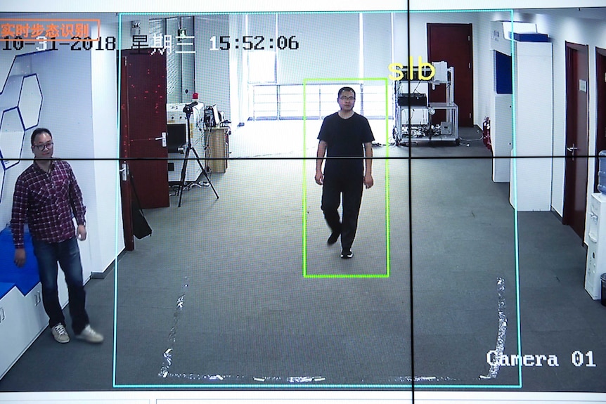 Watrix employees demonstrate their firm's gait recognition software at their company's offices in Beijing.