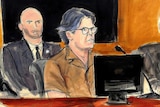 An artist's sketch shows Mr Raniere with his hair cut short surrounded by lawyers.