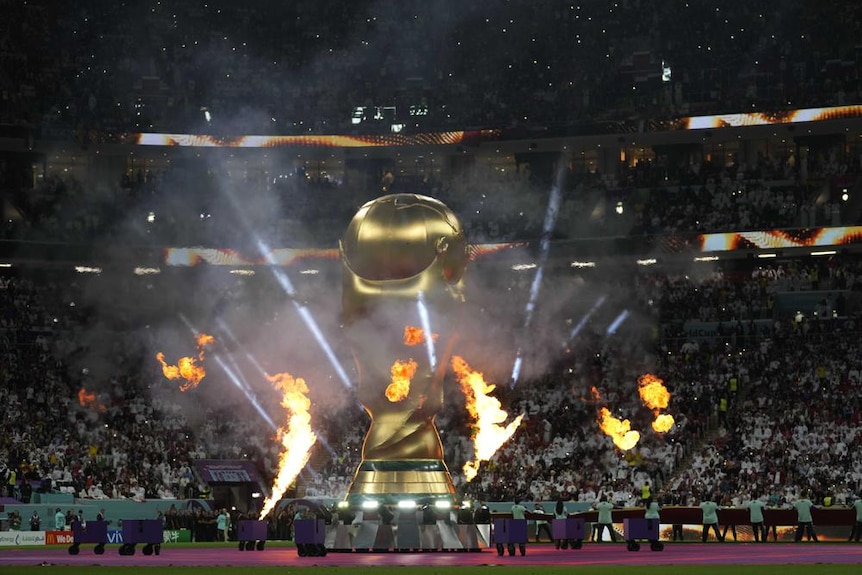 A giant inflateble copy of the trophy is displayed prior to the start of the World Cup