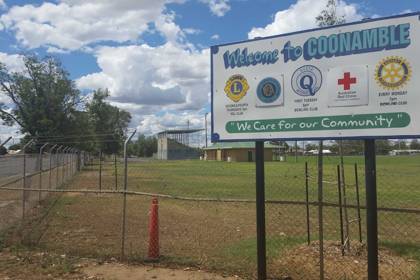 A 'Welcome to Coonamble' sign outside the town's football field