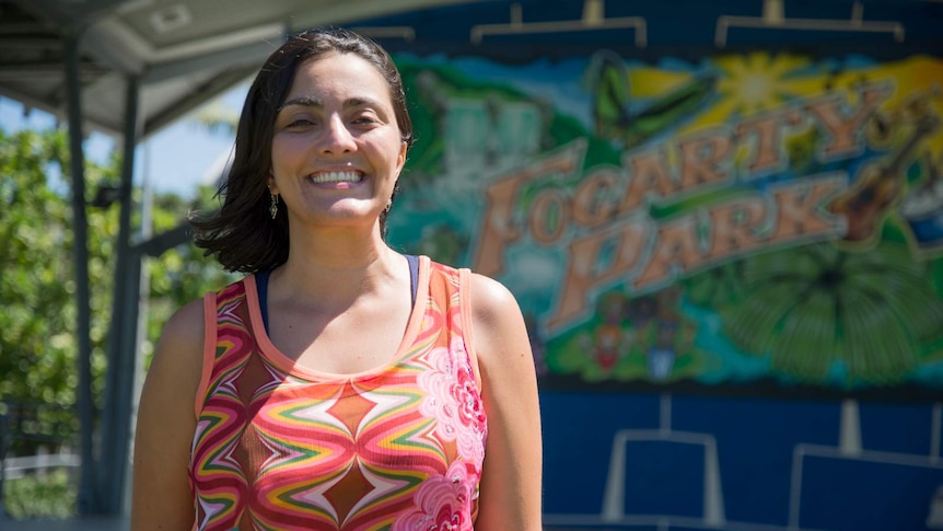 Fernanda Astolfo stands in front of the iconic Fogarty Park soundshell in Cairns.