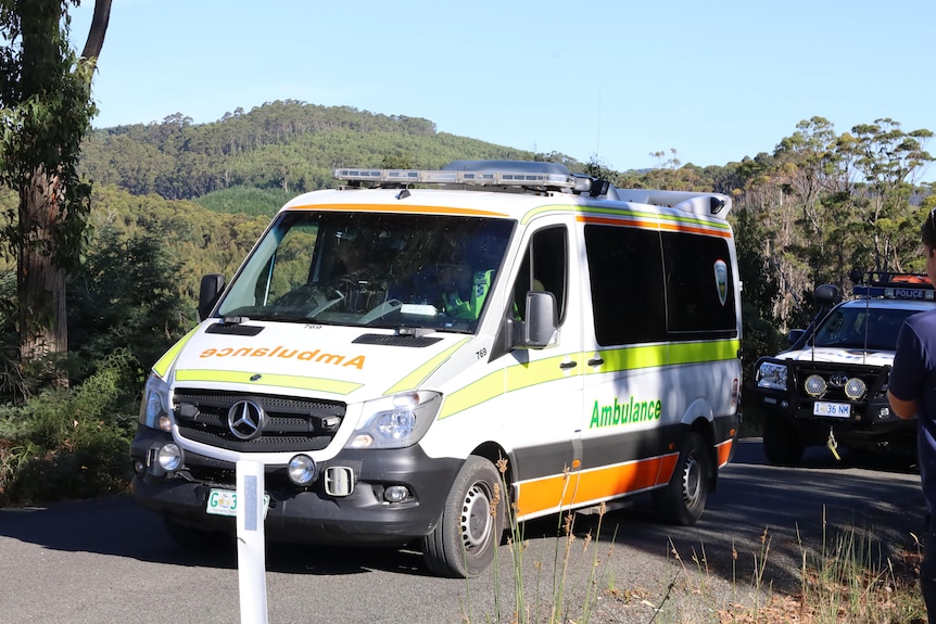 An ambulance on a country road
