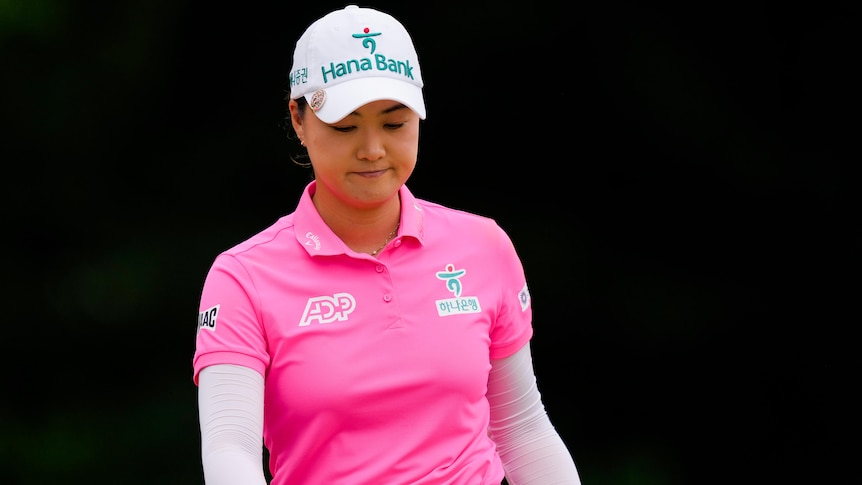 Australian golfer Minjee Lee looking down in sadness after a bogey