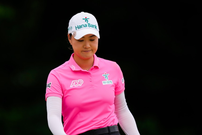 Australian golfer Minjee Lee looking down in sadness after a bogey