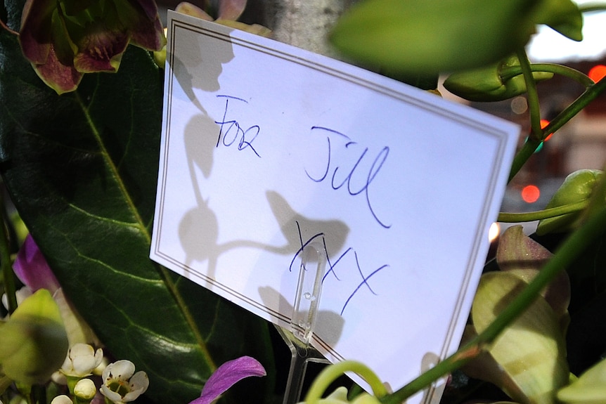 Flowers outside the shop where Jill Meagher was last seen