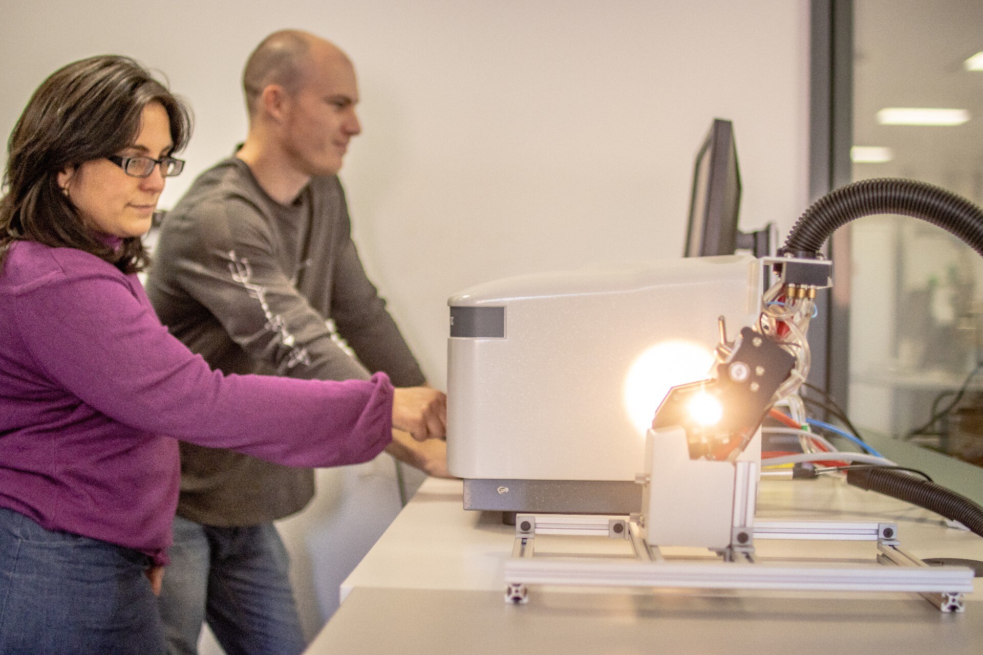 Woman and man standing in the laboratory