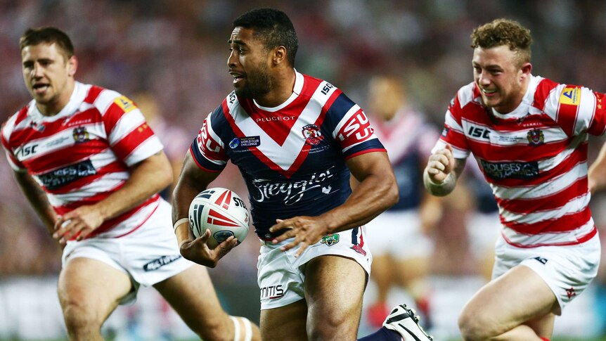 On fire ... Michael Jennings beats the defence to score the first Roosters try