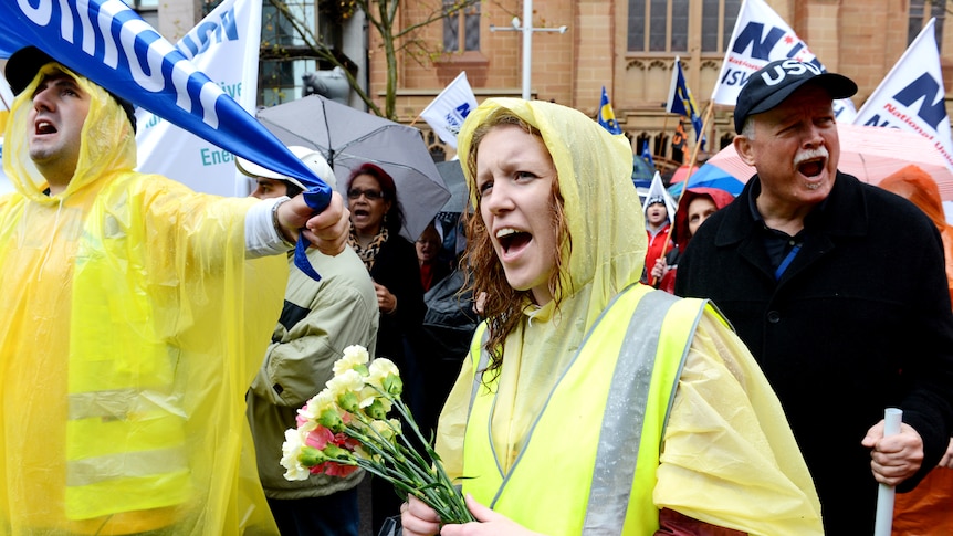 Wet weather didn't dampen the fury of union members outside Parliament.