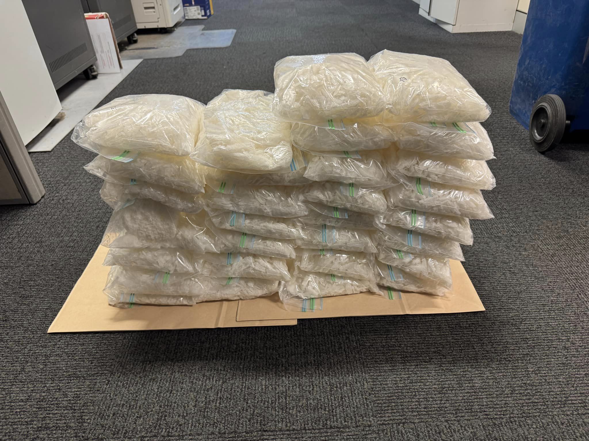 30kg of the drug ice stacked for a police photograph