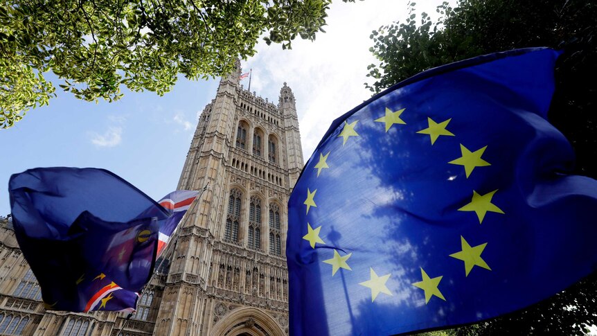A European Union flag flies near Britain's Parliament.