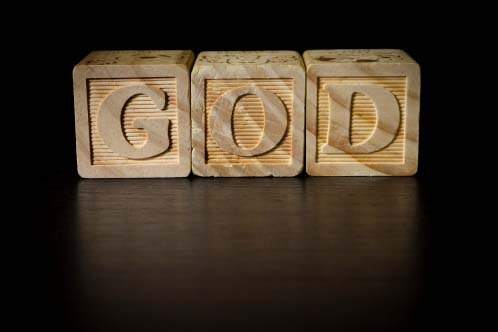 Wooden blocks spell out GOD