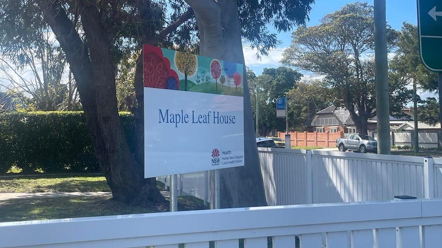 picture of a sign out the front of Maple Leaf House