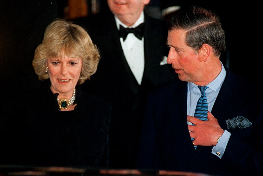 Charles with Camilla, wearing an ornate pearl and emerald necklace