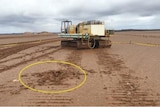 Drill rig on muddy salt lake