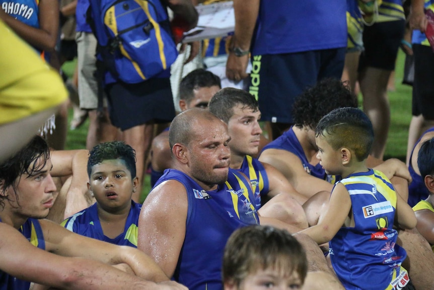 After their loss Wanderers commiserate, including star player Daniel Motlop (centre).