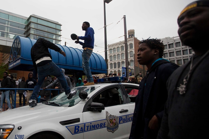 Baltimore police custody death protests turn violent