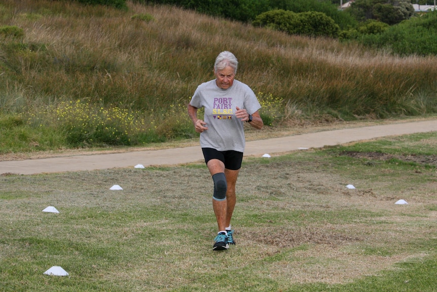 Judy Amoore Pollock runs with a knee brace on.