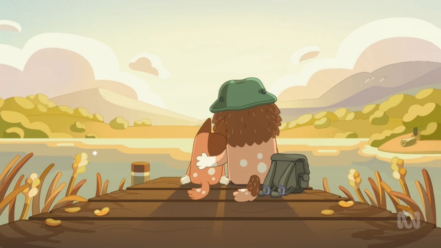 A cartoon dog and pup sit next to each other on a jetty for a story on parenting lessons from Bluey