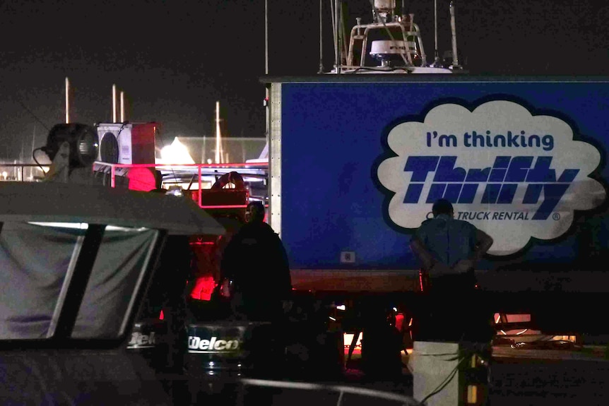 A dark photo of removal van at Geraldton Fishermen's Wharf.