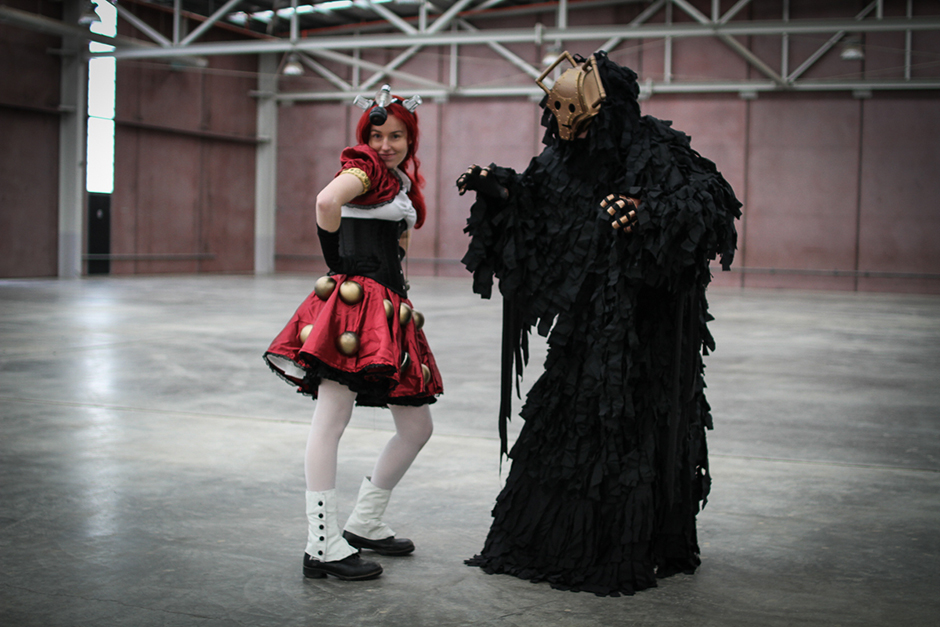 A man and woman in costume.