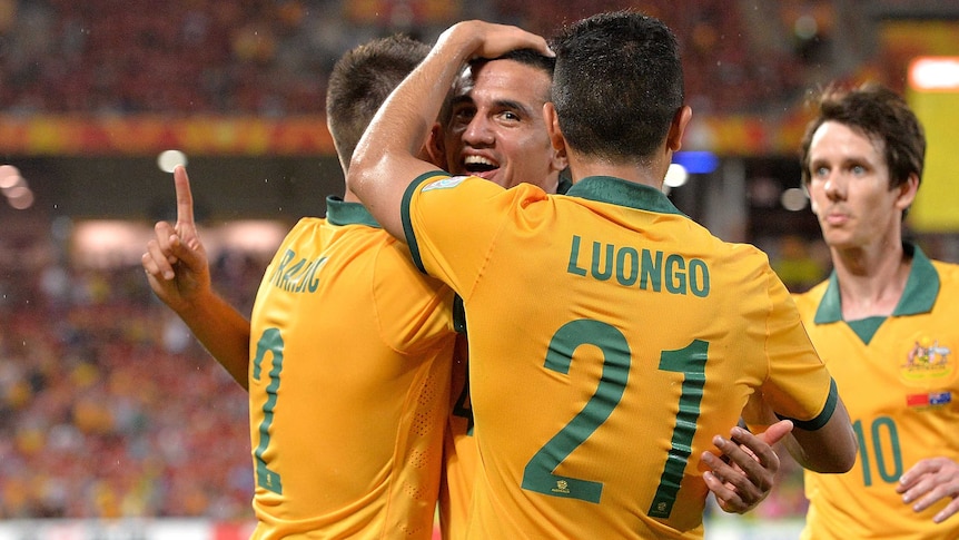 Tim Cahill of Australia celebrates after scoring a goal during the 2015 Asian Cup